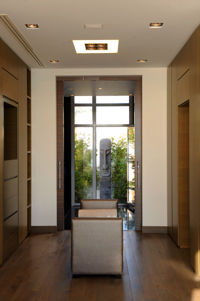 Photo of a contemporary dressing room in Other with feature lighting.
