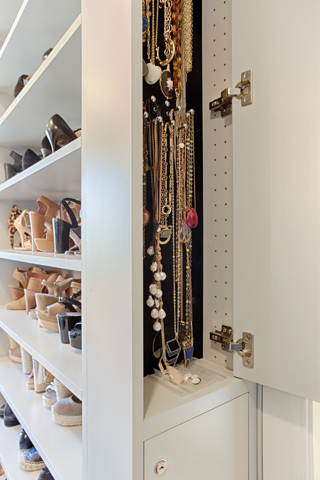 Large transitional gender-neutral walk-in closet photo in Philadelphia with flat-panel cabinets and gray cabinets