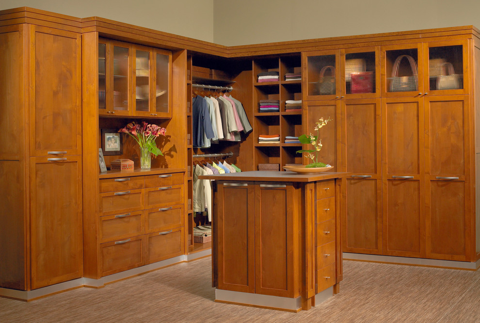 Inspiration for a mid-sized transitional gender-neutral walk-in closet remodel in Los Angeles with light wood cabinets and shaker cabinets