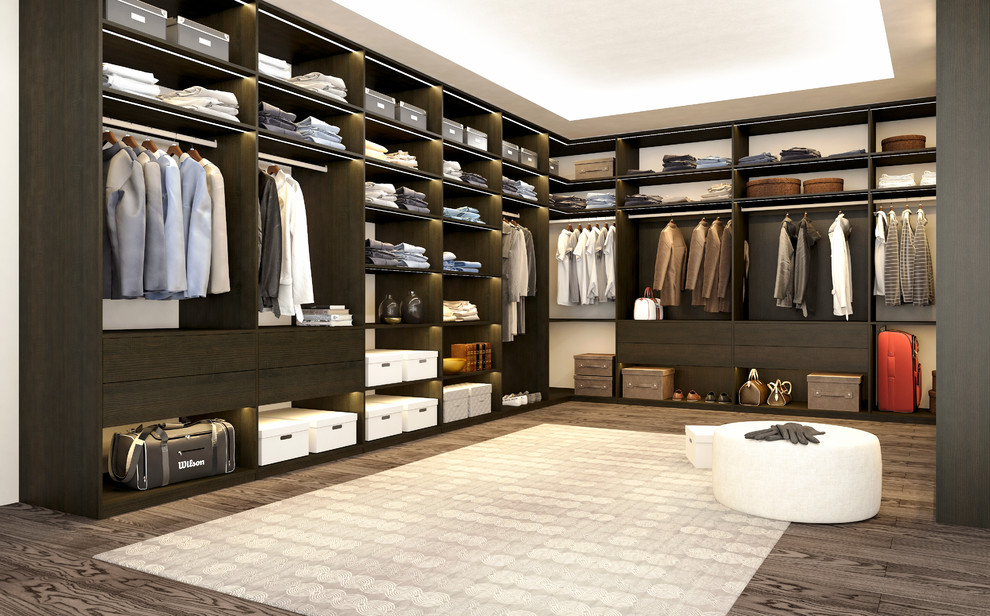 Immagine di un grande spazio per vestirsi moderno con nessun'anta e ante in legno bruno