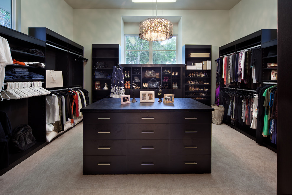 Example of a trendy walk-in closet design in Orlando
