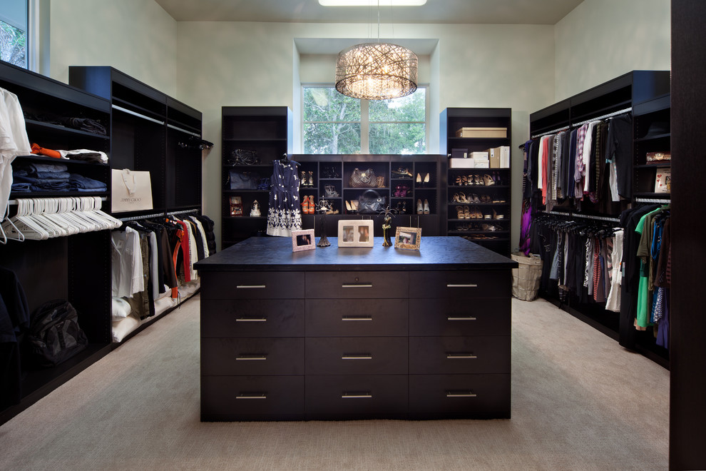 This is an example of a contemporary walk-in wardrobe in Orlando.