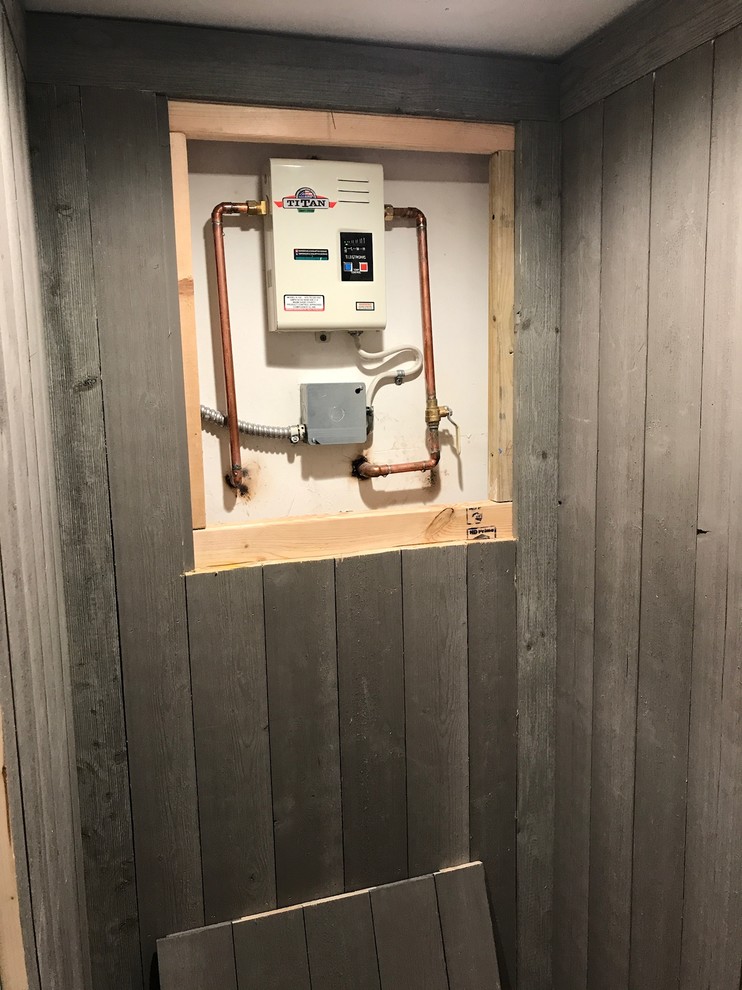 Water Heater Closet Conversion (to a Mini Wine Cellar) Transitional