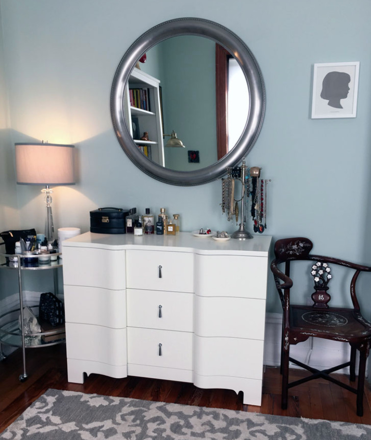 Inspiration for a small eclectic women's carpeted and gray floor dressing room remodel in New York with raised-panel cabinets and white cabinets