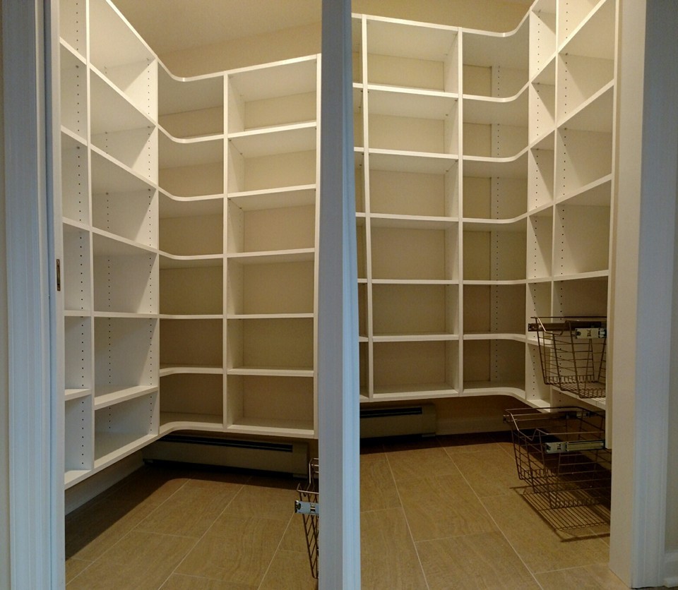 Inspiration for a medium sized modern walk-in wardrobe in Other with flat-panel cabinets, white cabinets and medium hardwood flooring.