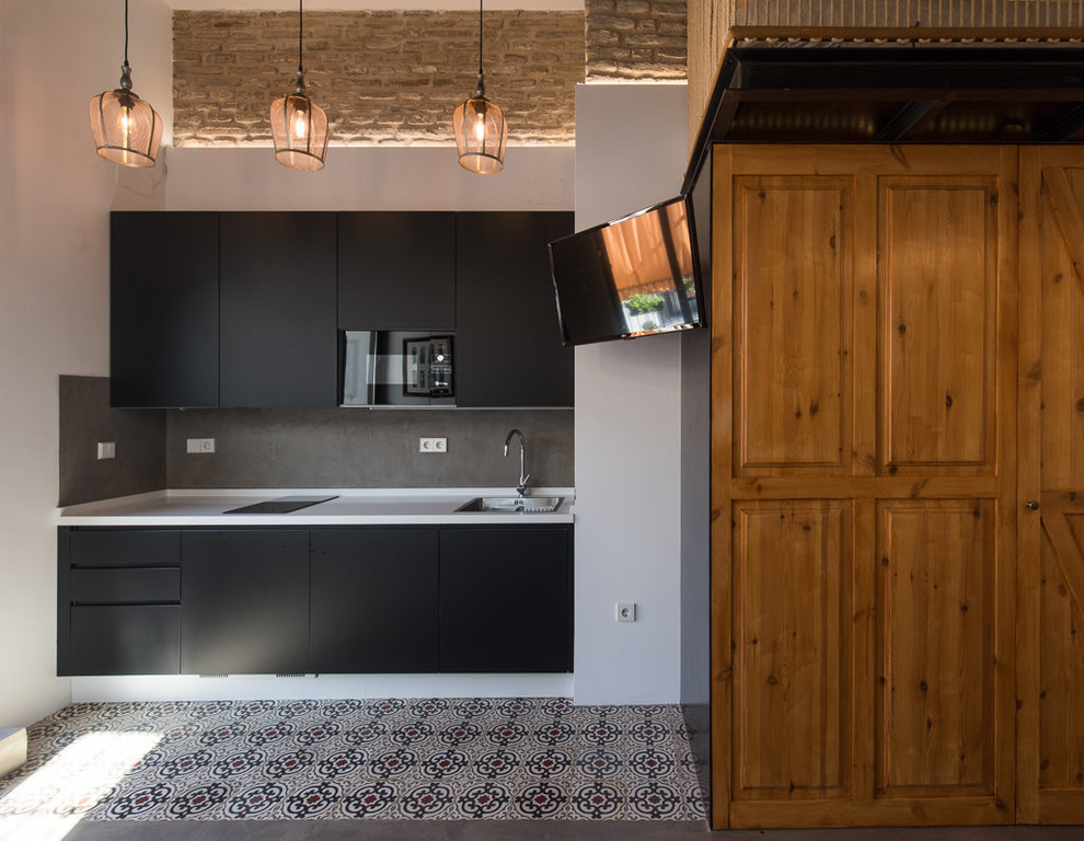 Свежая идея для дизайна: кухня в стиле лофт с диваном - отличное фото интерьера