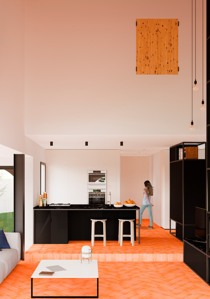 Photo of a medium sized mediterranean single-wall open plan kitchen in Other with a submerged sink, flat-panel cabinets, beige cabinets, marble worktops, black splashback, marble splashback, stainless steel appliances, ceramic flooring, an island, orange floors, black worktops and a wood ceiling.