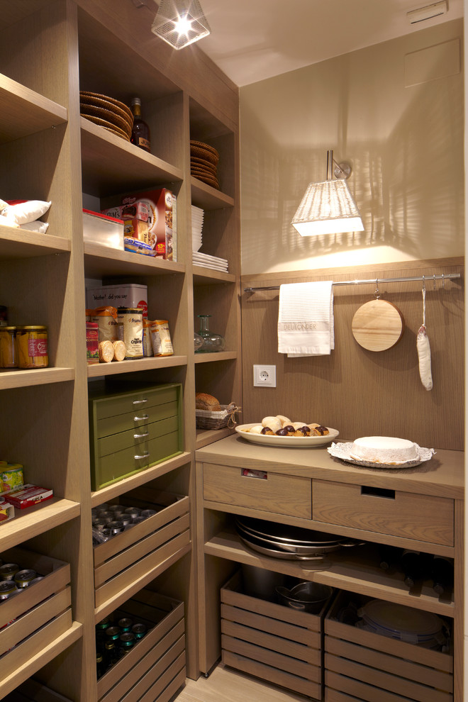 Design ideas for a small contemporary l-shaped kitchen pantry in Barcelona with no island.
