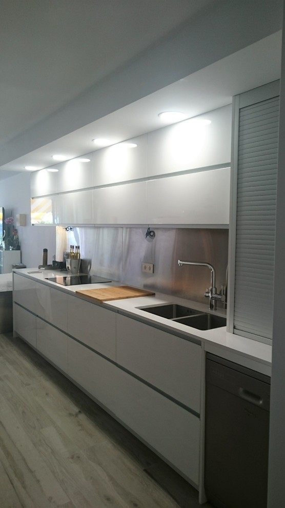 This is an example of a modern single-wall open plan kitchen in Alicante-Costa Blanca.
