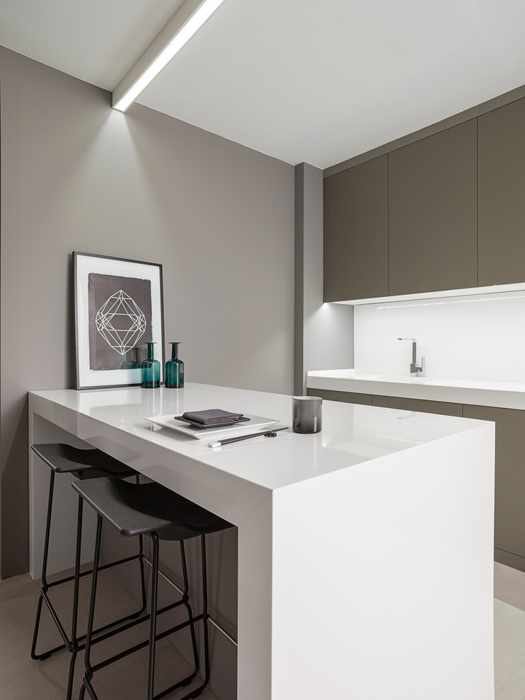 Design ideas for a medium sized modern galley kitchen in Other with an integrated sink, flat-panel cabinets, brown cabinets, white splashback, ceramic flooring, beige floors, white worktops, a breakfast bar and integrated appliances.