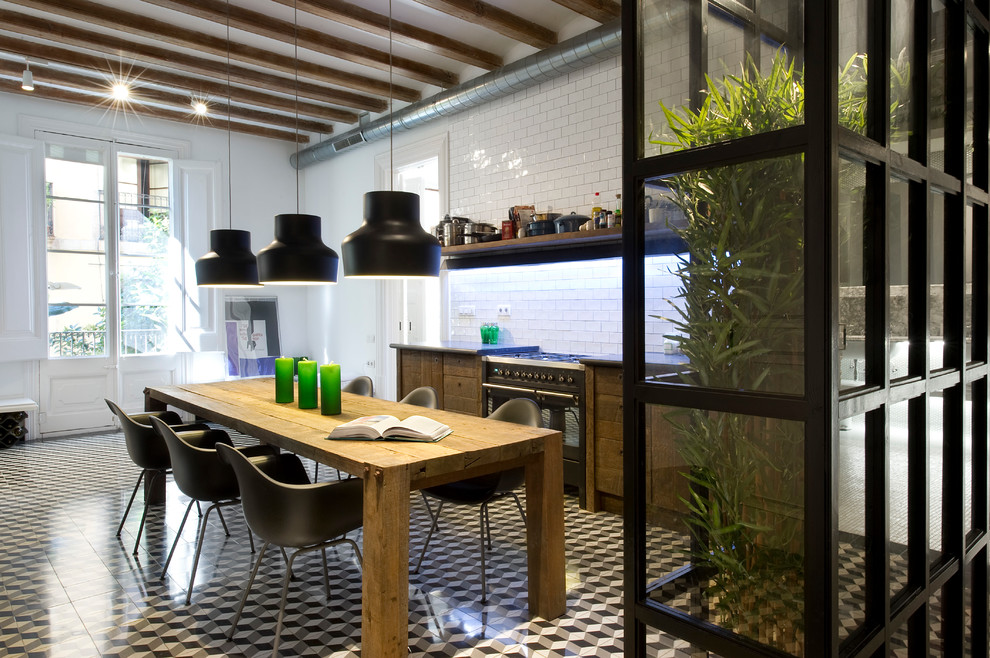 This is an example of a medium sized urban single-wall kitchen/diner in Barcelona with medium wood cabinets, white splashback, ceramic flooring, no island, open cabinets and metro tiled splashback.