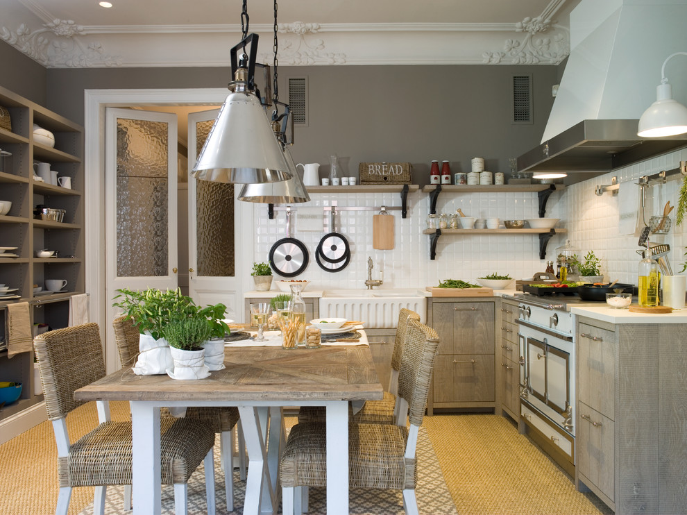 Medium sized rural l-shaped kitchen/diner in Barcelona with flat-panel cabinets, medium wood cabinets, white splashback, white appliances, no island, beige floors and a belfast sink.