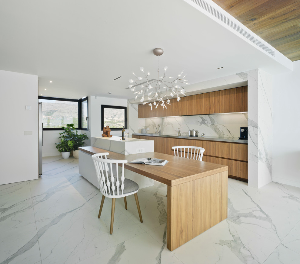 Inspiration for a large contemporary open plan kitchen in Alicante-Costa Blanca with flat-panel cabinets, medium wood cabinets, marble worktops, white splashback, marble splashback, marble flooring, an island and white floors.