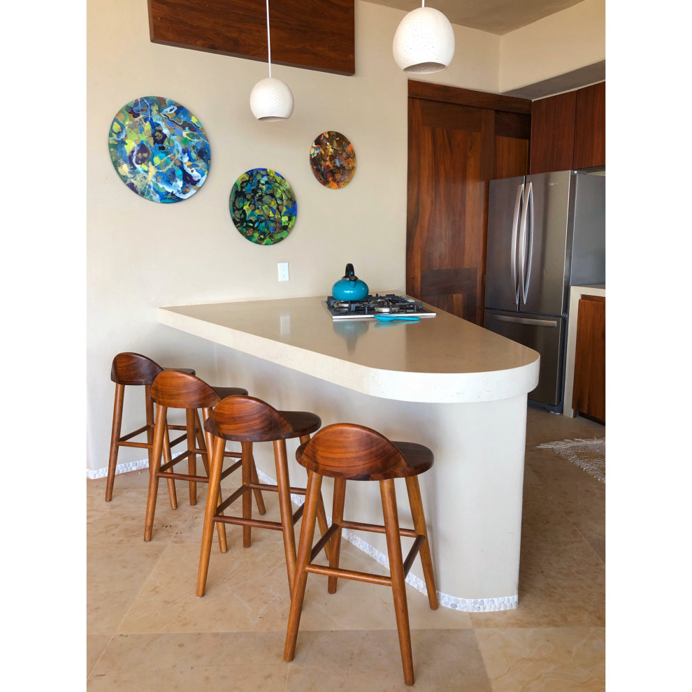 Example of a mid-sized beach style single-wall marble floor and beige floor eat-in kitchen design in Other with an undermount sink, quartz countertops, beige backsplash, quartz backsplash, stainless steel appliances, an island and beige countertops