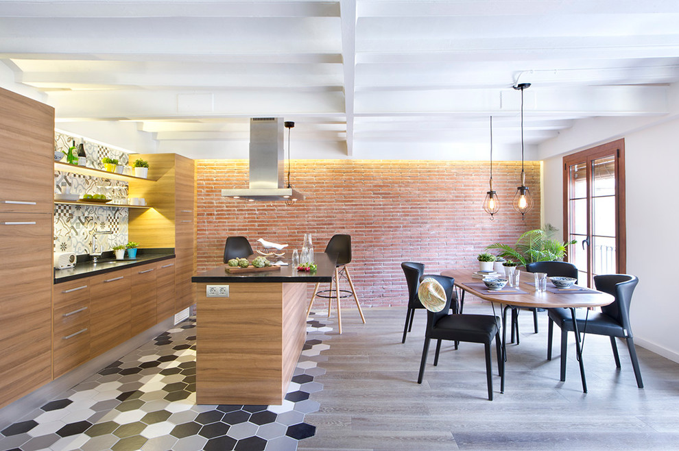 Mid-sized trendy kitchen/dining room combo photo in Madrid with white walls and no fireplace