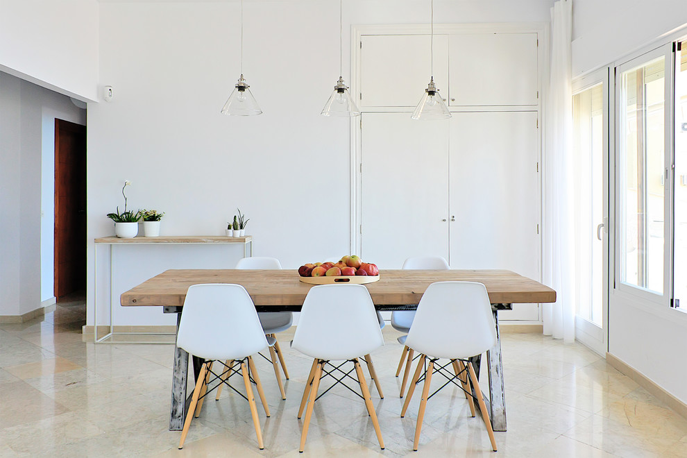 Exemple d'une salle à manger ouverte sur le salon scandinave de taille moyenne avec un mur blanc, un sol en carrelage de porcelaine et aucune cheminée.