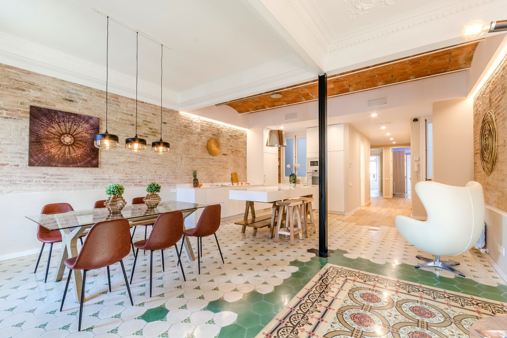Large contemporary open plan dining room in Barcelona with ceramic flooring and green floors.