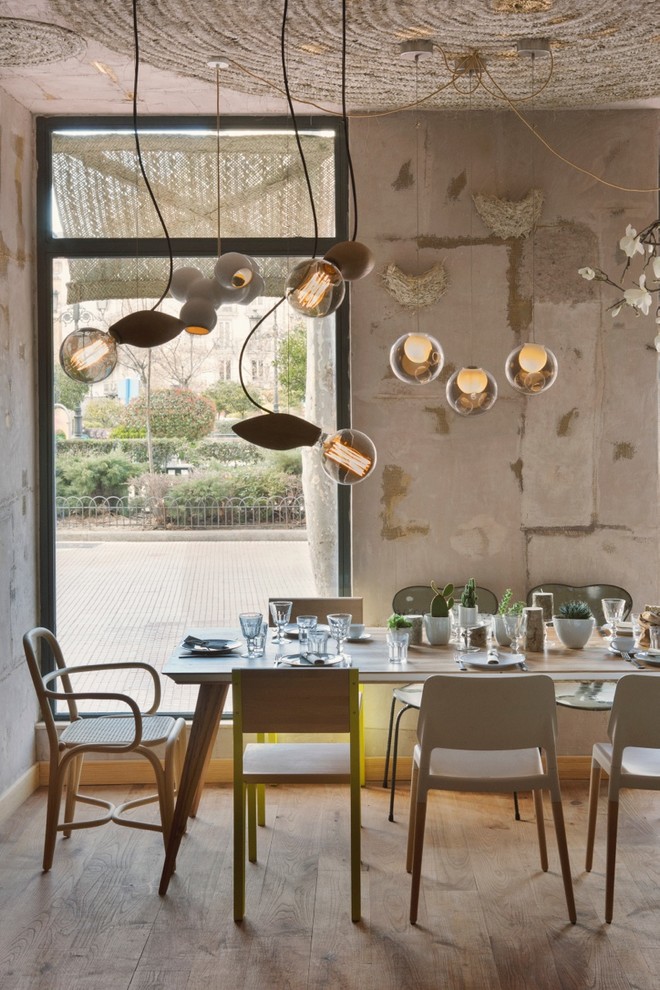 Photo of a rustic dining room in Madrid.