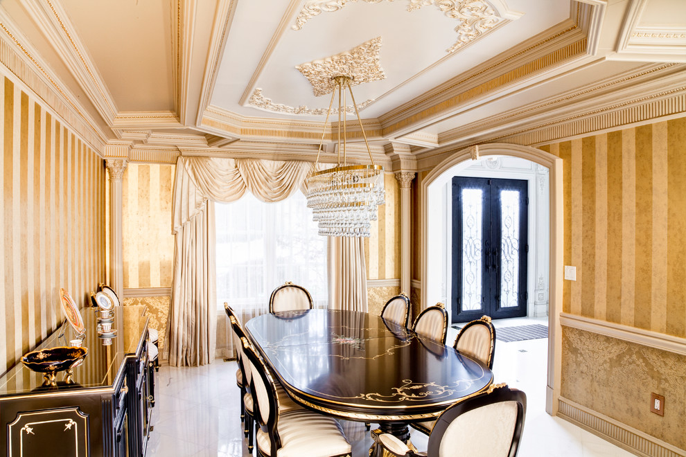 Inspiration for a mediterranean enclosed dining room in New York with yellow walls.