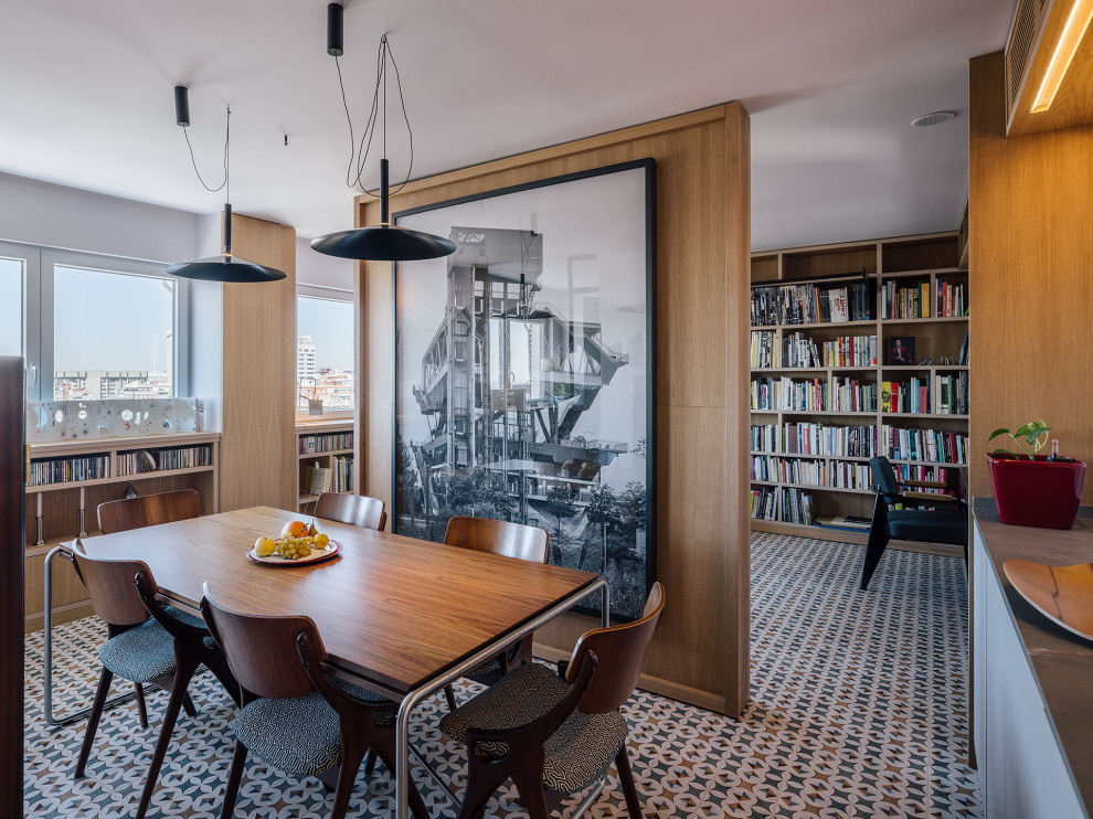 This is an example of a large contemporary open plan dining room in Madrid with ceramic flooring, wood walls, white walls and multi-coloured floors.