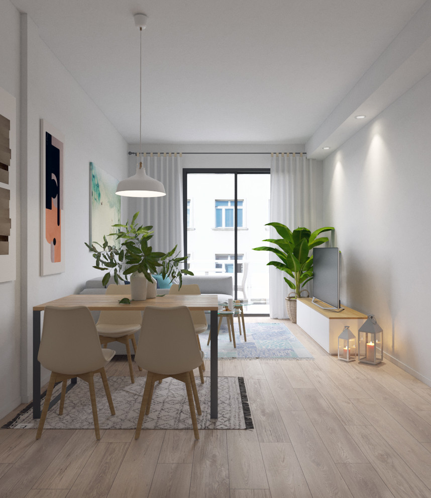 Design ideas for a small scandinavian open plan dining room in Barcelona with white walls and medium hardwood flooring.