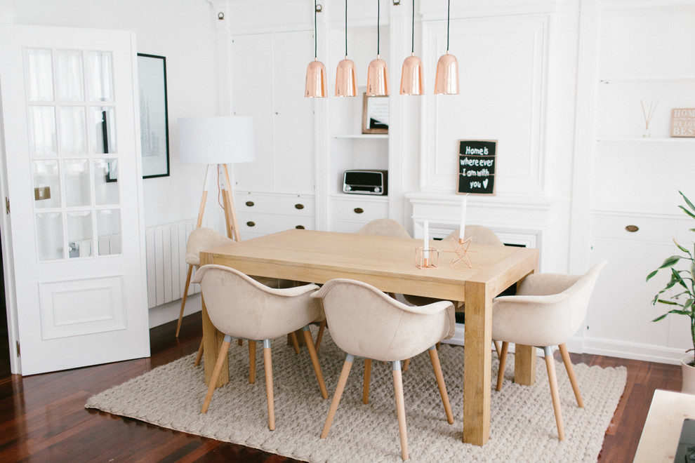 Inspiration for a medium sized scandinavian open plan dining room in Valencia with white walls, dark hardwood flooring and no fireplace.