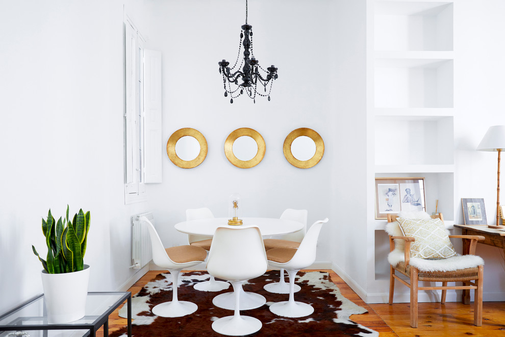 This is an example of a large scandinavian dining room in Madrid.