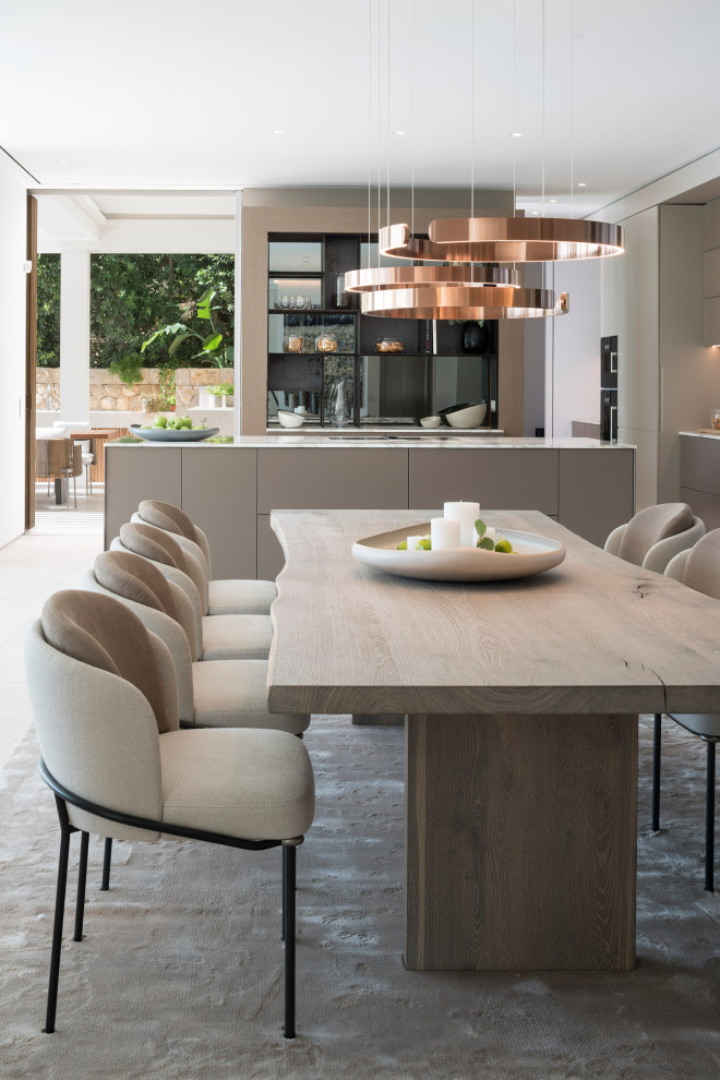 Example of a trendy kitchen/dining room combo design in Palma de Mallorca