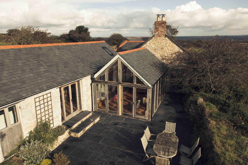 Example of a farmhouse sunroom design in Cornwall