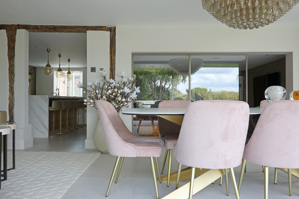 Inspiration for a large contemporary open plan dining room in Berkshire with white walls and white floors.