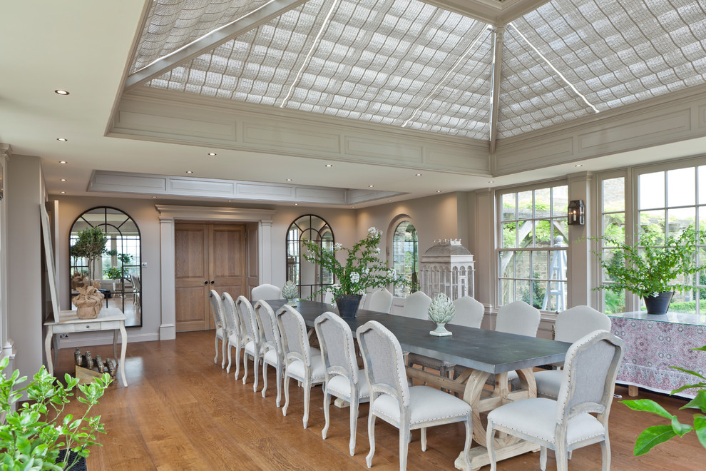 Inspiration for an expansive classic dining room in Other with dark hardwood flooring and no fireplace.