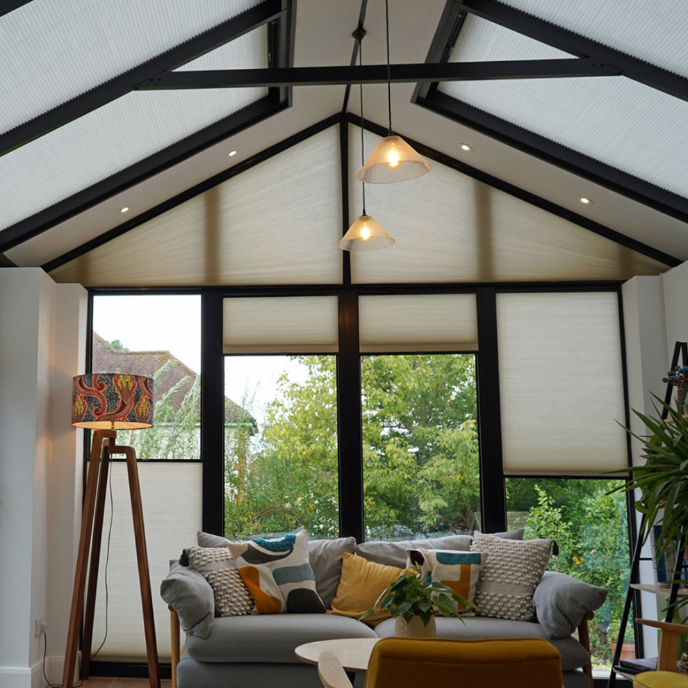 Photo of a contemporary conservatory in Surrey.