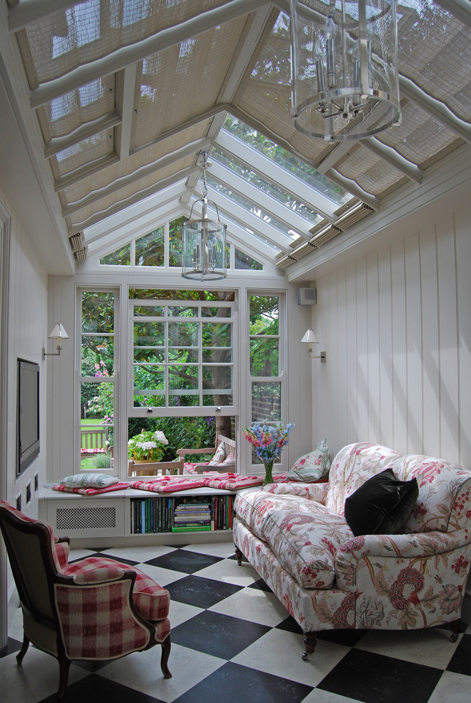 Inspiration for a timeless multicolored floor sunroom remodel in Kent with a glass ceiling