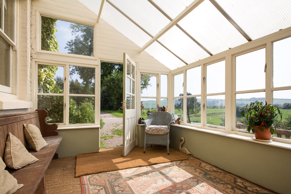 Sunroom - farmhouse sunroom idea in Devon with a standard ceiling