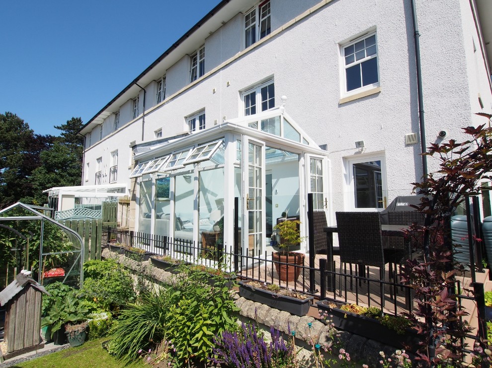 Photo of a medium sized modern conservatory in Other.