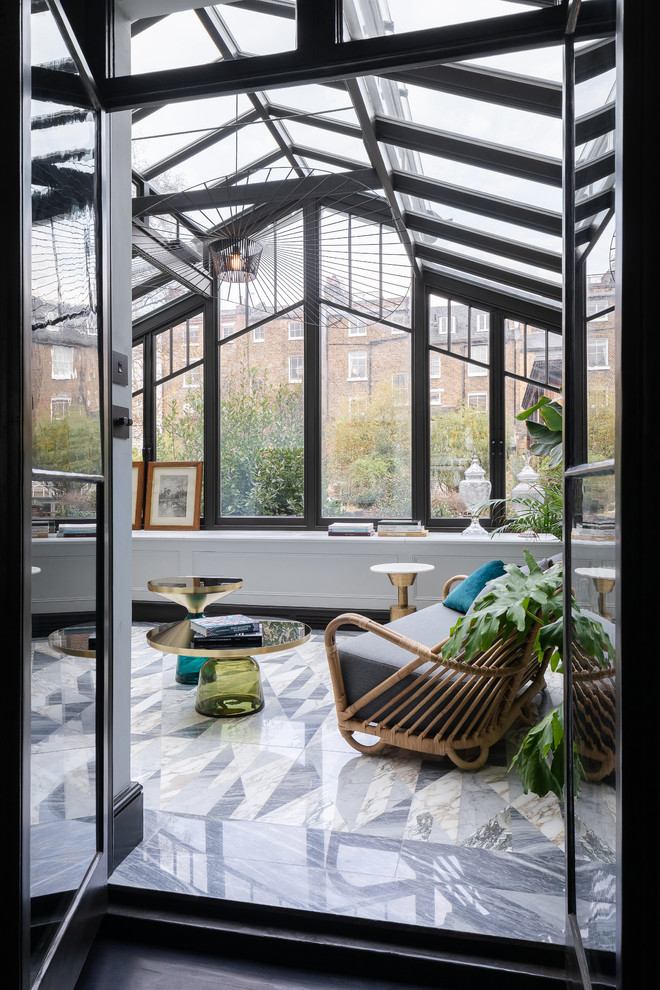 Example of a trendy sunroom design in London