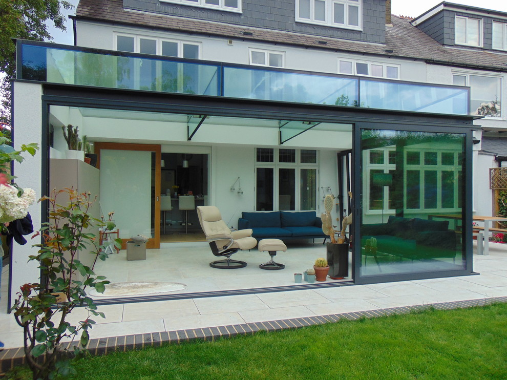 This is an example of an expansive modern conservatory in Kent.