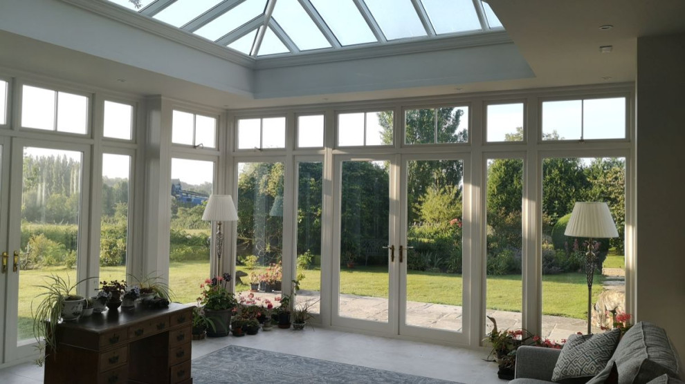 Photo of a medium sized traditional conservatory in Other.