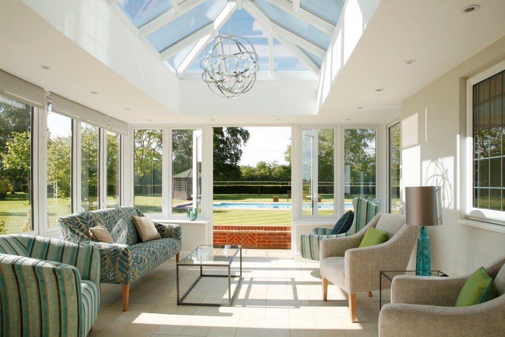 Inspiration for a traditional conservatory in Hertfordshire with a skylight, beige floors and feature lighting.