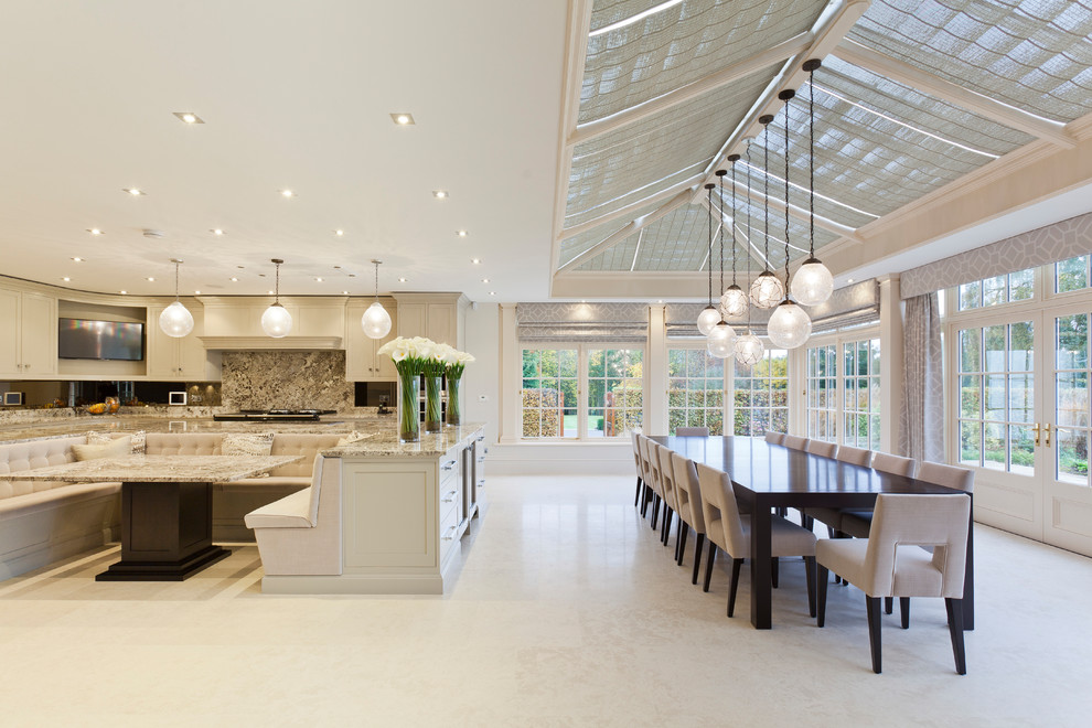 Photo of an expansive traditional conservatory in West Midlands with ceramic flooring and a skylight.