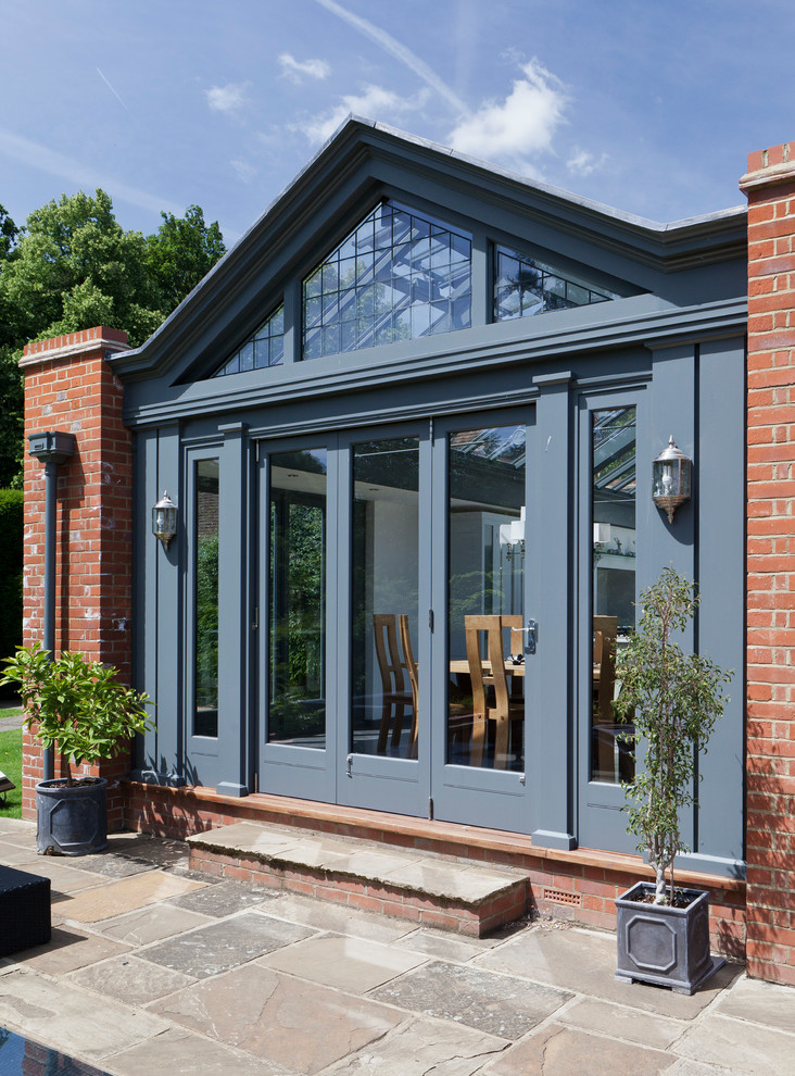This is an example of a large contemporary conservatory in Other.