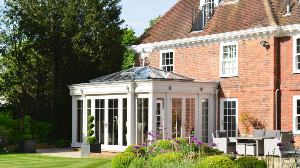 This is an example of a medium sized classic conservatory in Other.