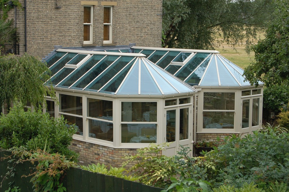 Design ideas for a large classic conservatory in Cambridgeshire with a glass ceiling.