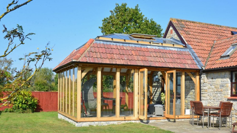 Medium sized rustic conservatory in Other.
