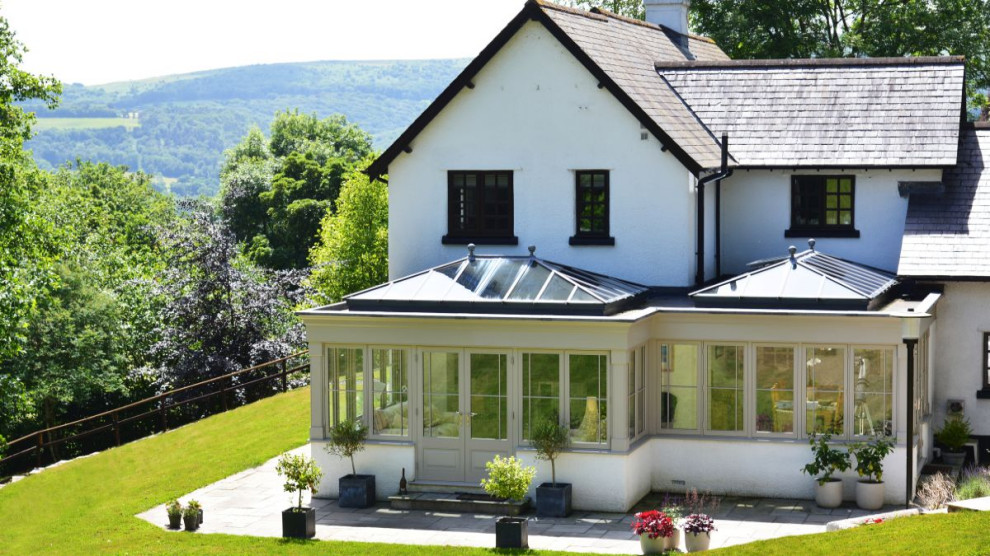 Photo of a large farmhouse conservatory in Devon.
