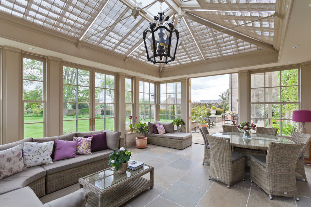 Inspiration for a large traditional conservatory in Other with travertine flooring, no fireplace and a glass ceiling.