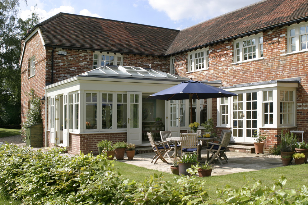 Inspiration for a large timeless sunroom remodel in Oxfordshire