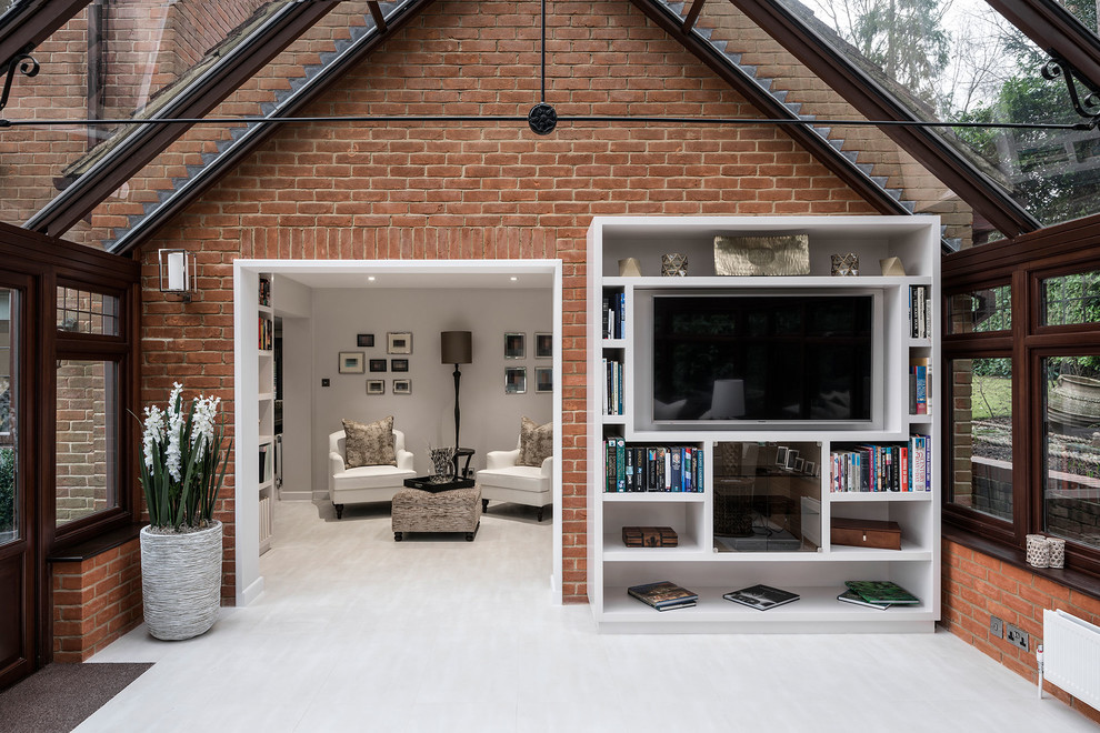 This is an example of a large contemporary conservatory in Berkshire with ceramic flooring and beige floors.