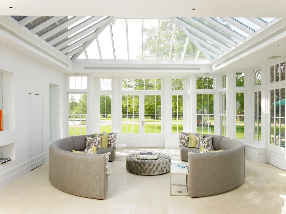 Photo of an expansive traditional conservatory in London with a glass ceiling.