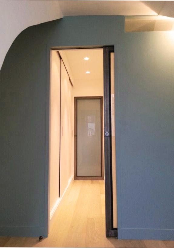 Hallway - contemporary hallway idea in Paris
